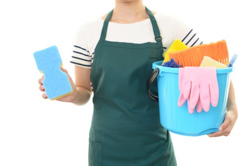 Carpet cleaning team preparing equipment safely before work begins